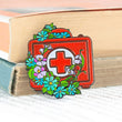 Charger l'image dans la galerie, First aid kit enamel pin for nurses, doctors and emergency healthcare workers
