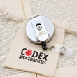 Load image into Gallery viewer, Codex Anatomicus badge reel back
